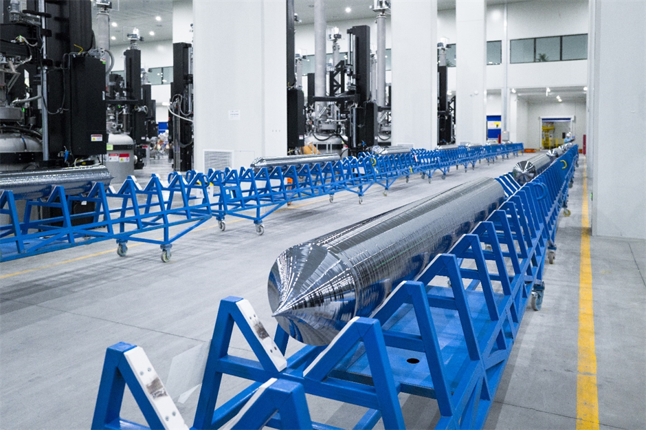 210N monocrystalline silicon rod being transported in the factory